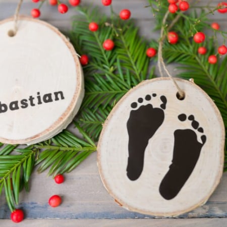 Use your Cricut Explore or other cutting machine to easily cut your newborn's footprints out of vinyl to make a sweet keepsake ornament.