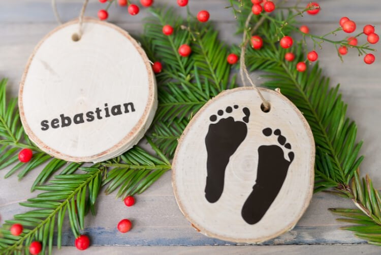 Use your Cricut Explore or other cutting machine to easily cut your newborn's footprints out of vinyl to make a sweet keepsake ornament.