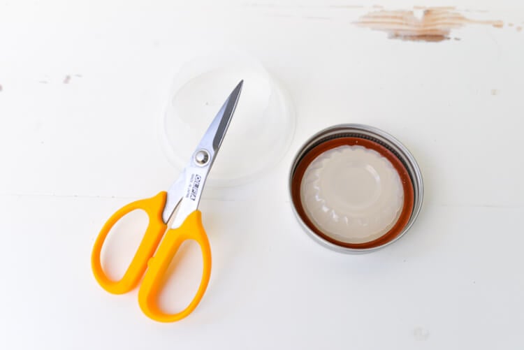 lid and scissors for glittery Mason Jar Snow Globe 