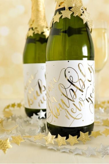 A champagne bottle decked with these cute foiled labels is the perfect hostess gift to bring to a New Year's Eve party!