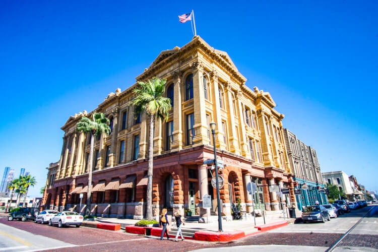 A large building on the corner of a street