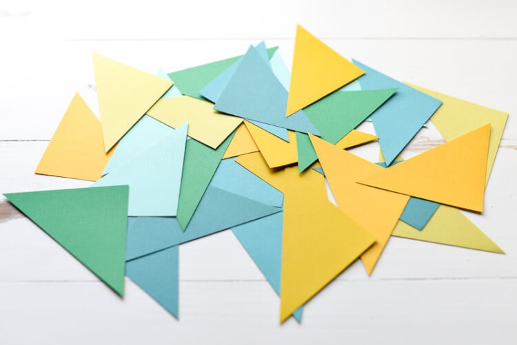 A pile of cardstock paper cut into triangles