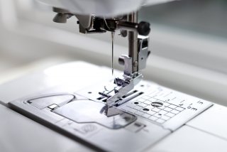 Image of a needle on a sewing machine