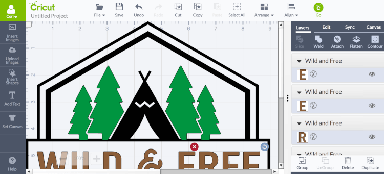 Design image in Cricut Design Space of a tent, trees and the text, \"Wild & Free\"