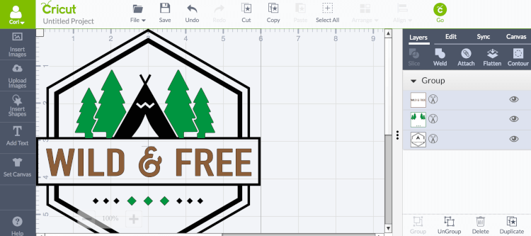 Design image in Cricut Design Space of a tent, trees and the text, \"Wild & Free\"
