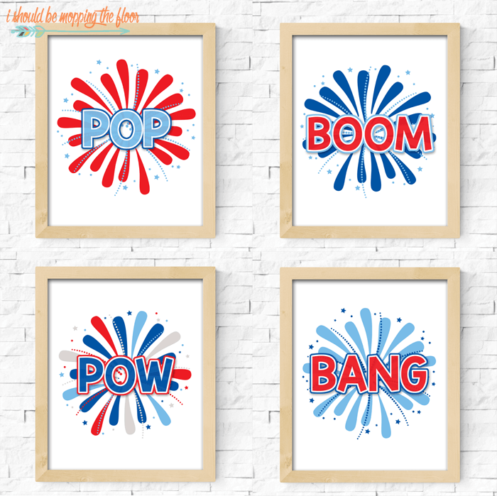 Four wooden framed pictures of fireworks and one says, \"Pop\" and one says, \"Boom\" and the third one says, \"Pow\" and the last one says, \"Bang\"