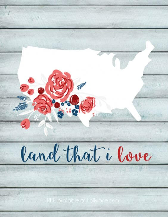 A white outline of the USA against a wooden background and the USA outline is adorned with images of flowers and below the USA is text that says, \"Land the I Love\"