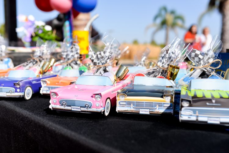 A close up of several toy roadster racer cars