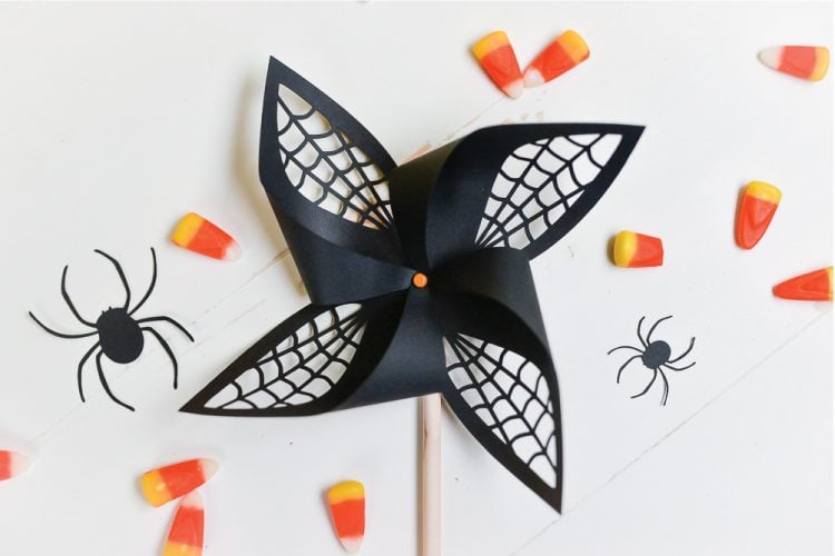 Get the SVG cut files for these Halloween spider web pinwheels! Delicate web cut-outs make these spooky pinwheels a hit at any Halloween party.