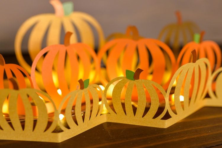Paper cut pumpkin luminaria