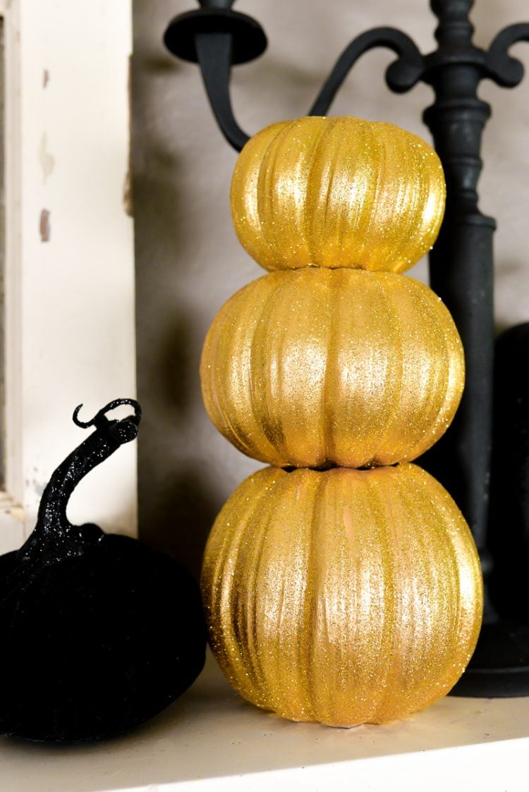 Close up of gold and black pumpkins