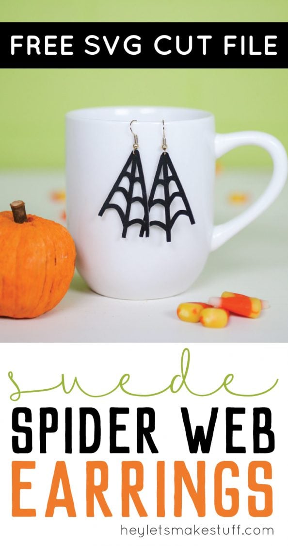On a table sits a small pumpkin, some candy corn candy and a coffee mug with earrings hanging from it with advertising from HEYLETSMAKESTUFF.COM for suede spider web earrings