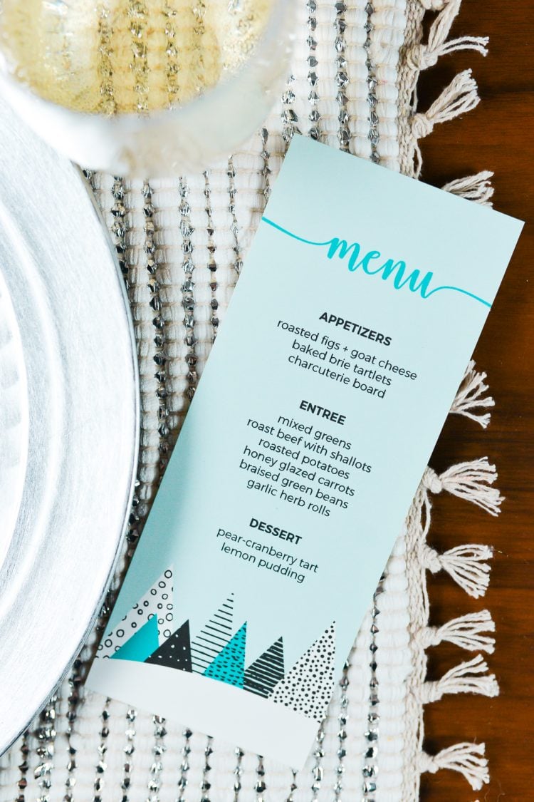 A place setting with a printed menu next to it