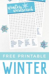 Decorative snowflakes lying next to two Winter Wordsearch papers with advertising for free printable Winter Wordsearch from HEYLETSMAKESTUFF.COM