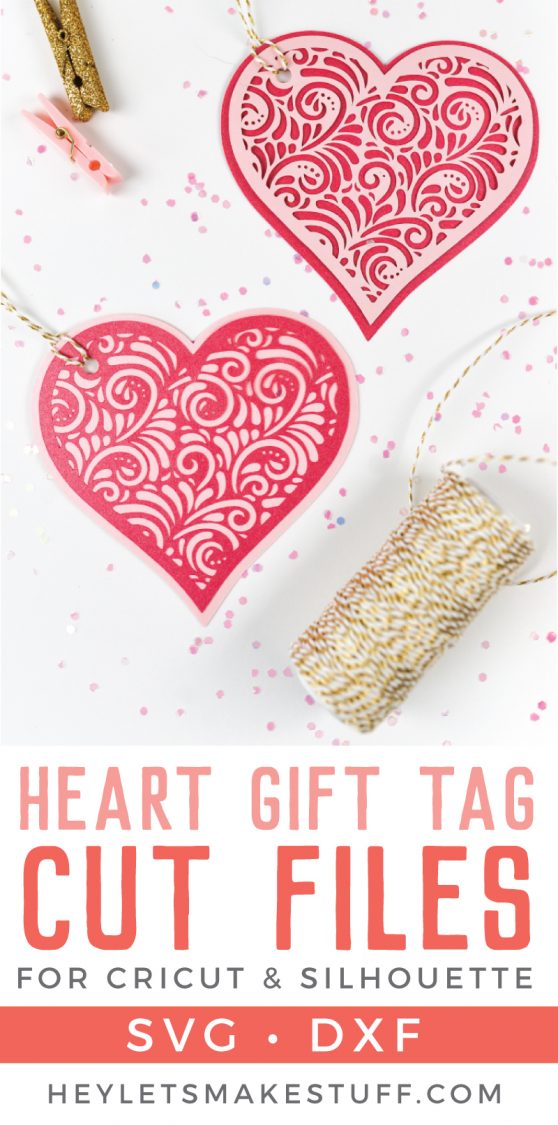 A roll of twine and two small clothespins next to two hearts cut out of paper with advertising for Heart Gift Tag Cut Files for Cricut and Silhouette from HEYLETSMAKESTUFF.COM