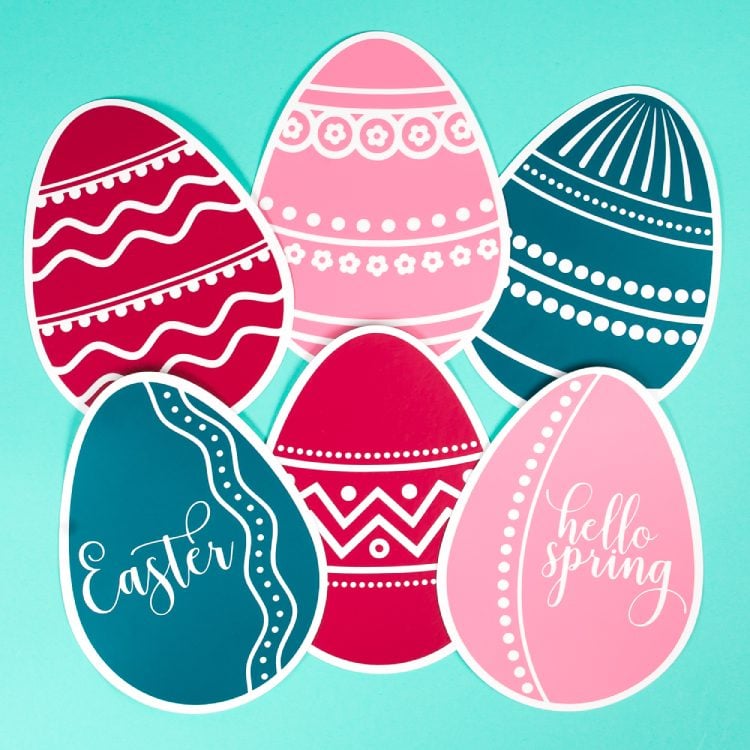 Paper cut Easter eggs decorated with white iron-on vinyl