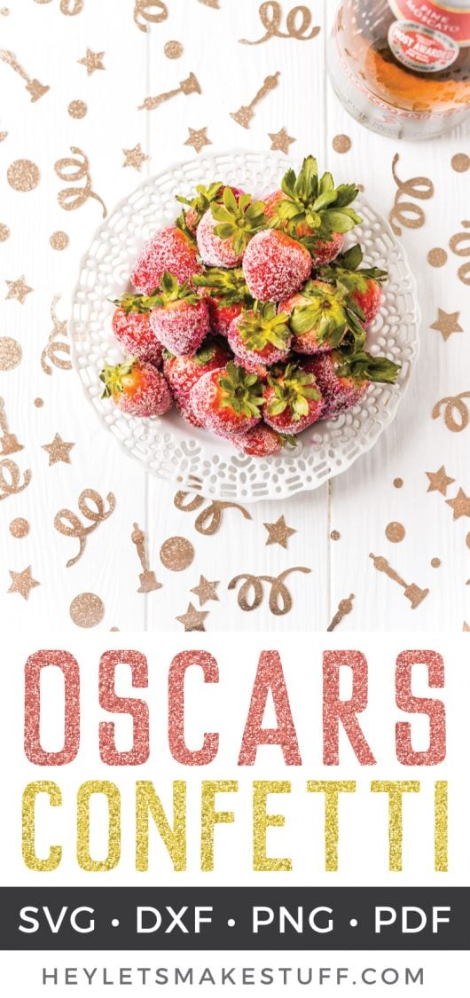 Gold glittery images of stars, dots swirls and Oscar award statues confetti on top of a table that holds a bowl of sugar covered strawberries and a bottle of wine with advertising for Oscars Confetti from HEYLETSMAKESTUFF.COM