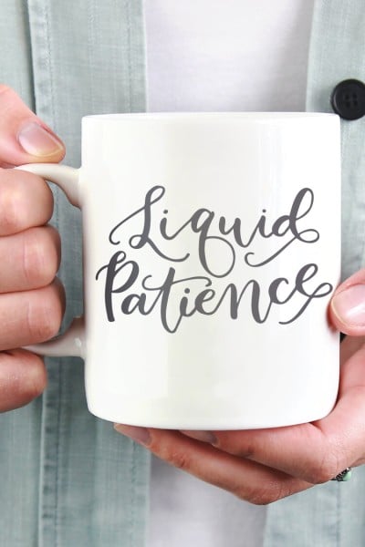 A person holding a cup of coffee, with "Liquid Patience" saying