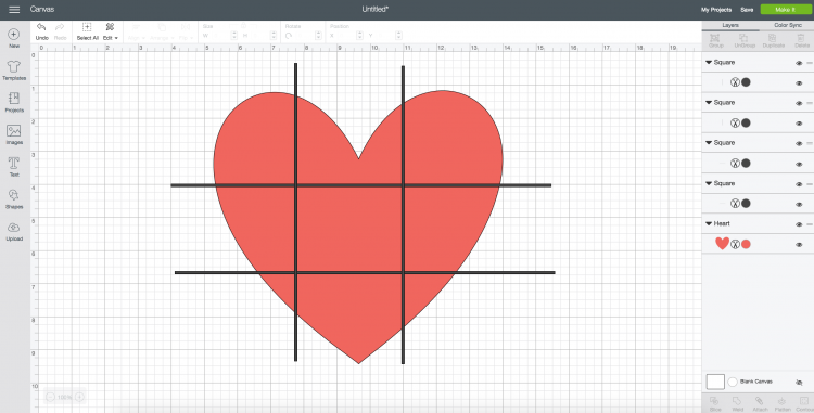 A screen in Design Space showing a red heart shaped design with two black horizontal lines and two black vertical lines going through it