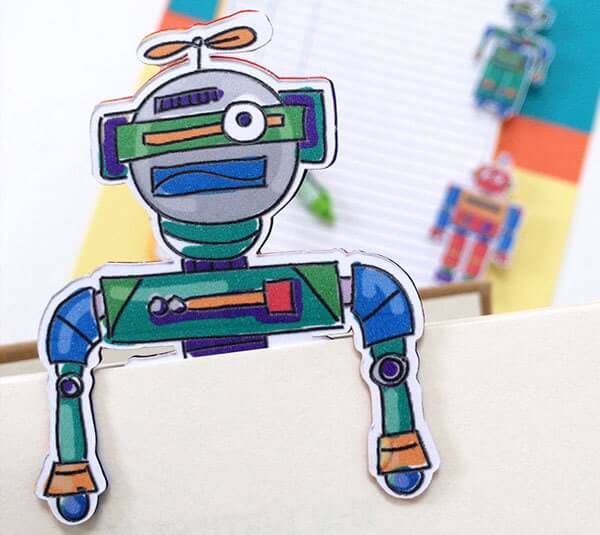 A book with a bookmark that looks like a robot