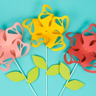 Three pinwheels cut out of paper