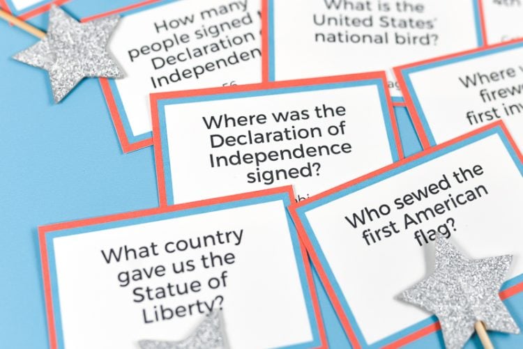 Close up of 4th of July trivia questions printed on individual cards