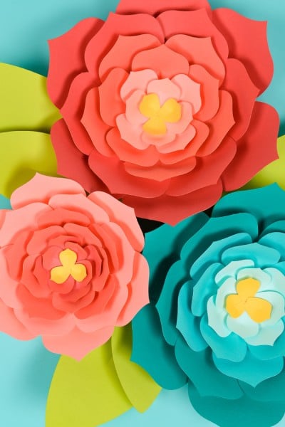 A close up of giant paper flowers
