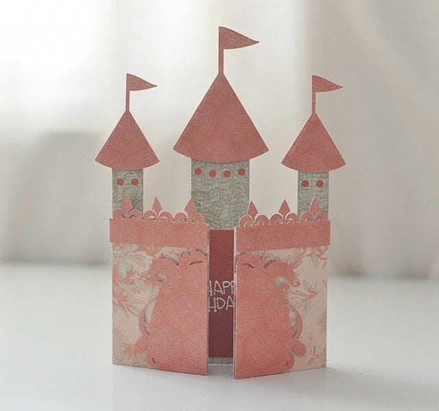 A card that is made in the shape of a castle