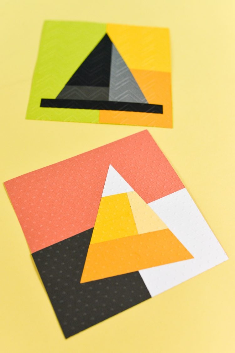 Craft paper cut into a witch\'s hat and a piece of candy corn candy