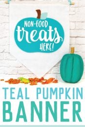 Teal pumpkin next to a hanging banner that says, "Non-Food Treats Hear!" with advertising from HEYLETSMAKESTUFF.COM for food allergy awareness and free cut file to make a teal pumpkin banner