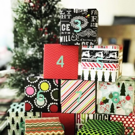Christmas countdown boxes in a stack.