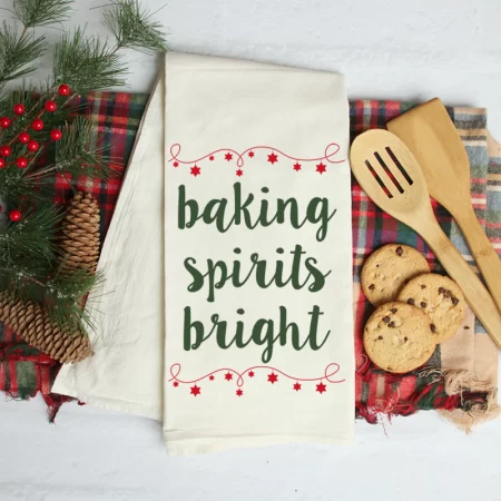 White kitchen towel that says Baking Spirits Bright