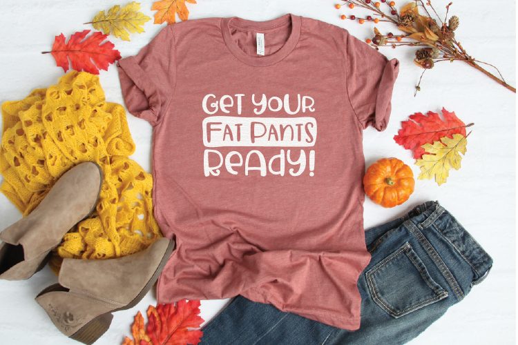 Shirt with "get your fat pants ready" on it