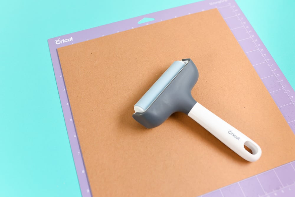 Use a Brayer to secure your chipboard to the mat