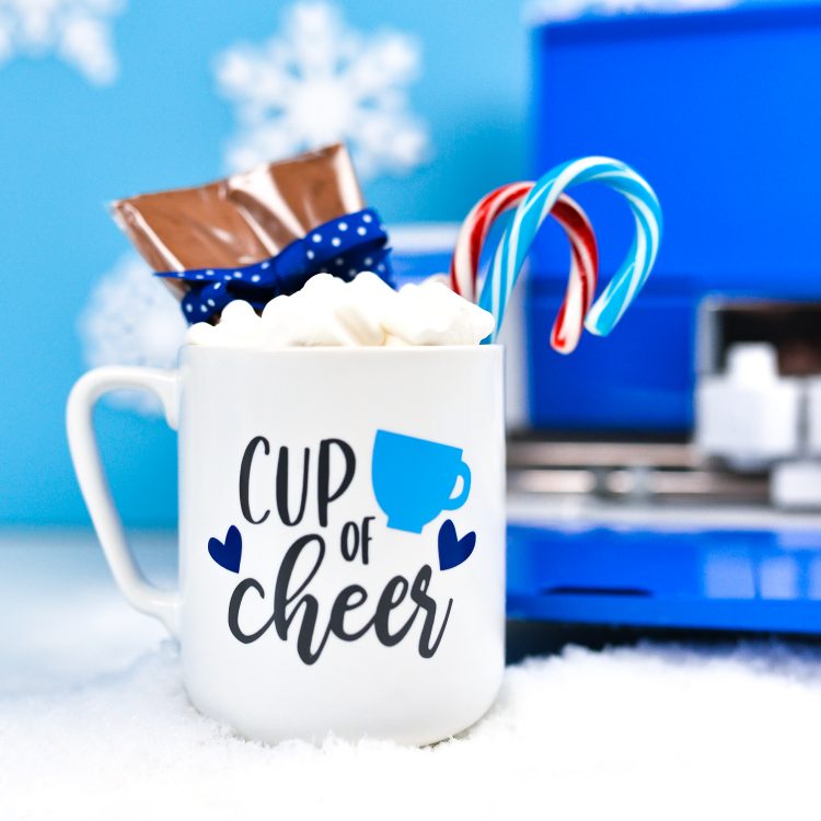Looking for a sweet homemade gift to give this Christmas? This hot cocoa mug gift is perfect for almost everyone on your list! Easily make custom gifts like this using your Cricut Explore Air 2, now in gorgeous Cobalt!
