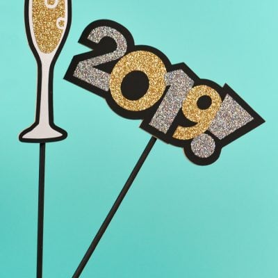 Chipboard images of a glass of champagne and the year 2019