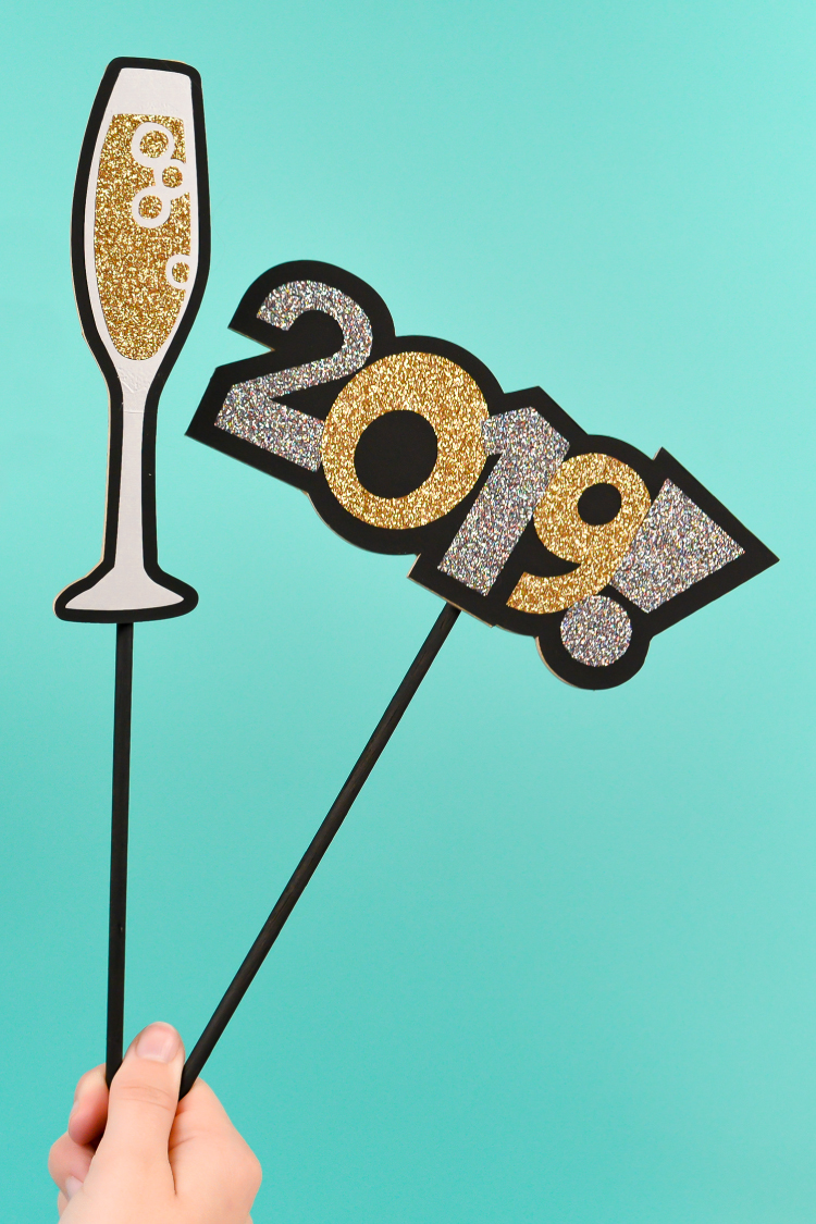 Chipboard images of a glass of champagne and the year 2019