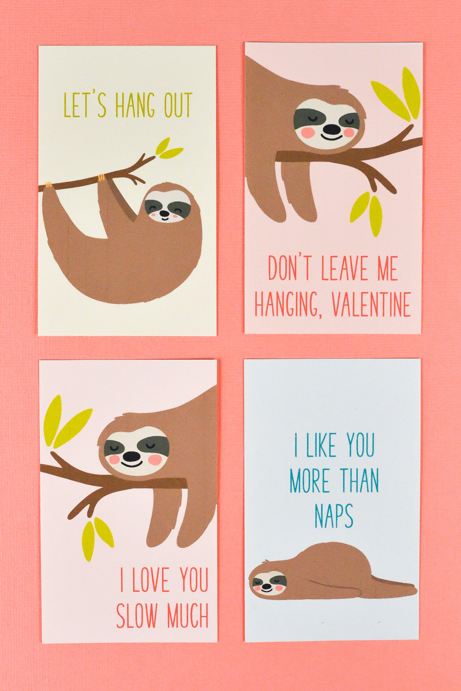 Four cards with images of a sloth on each one and the following sayings, \"Don\'t Leave Me Hanging, Valentine\", \"I Love You More Than Naps\", Let\'s Hang Out\" and \"I Love You Slow Much\"