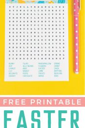 A pink polka dotted pen sitting next to an Easter Word Search paper and advertising from HEYLETSMAKESTUFF.COM for a Free Printable Easter Word Search