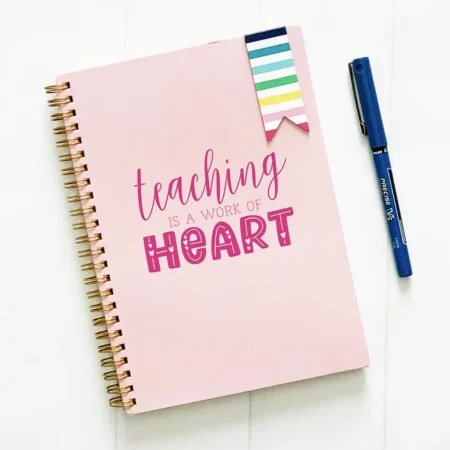 Teaching is a work of heart SVG on a journal