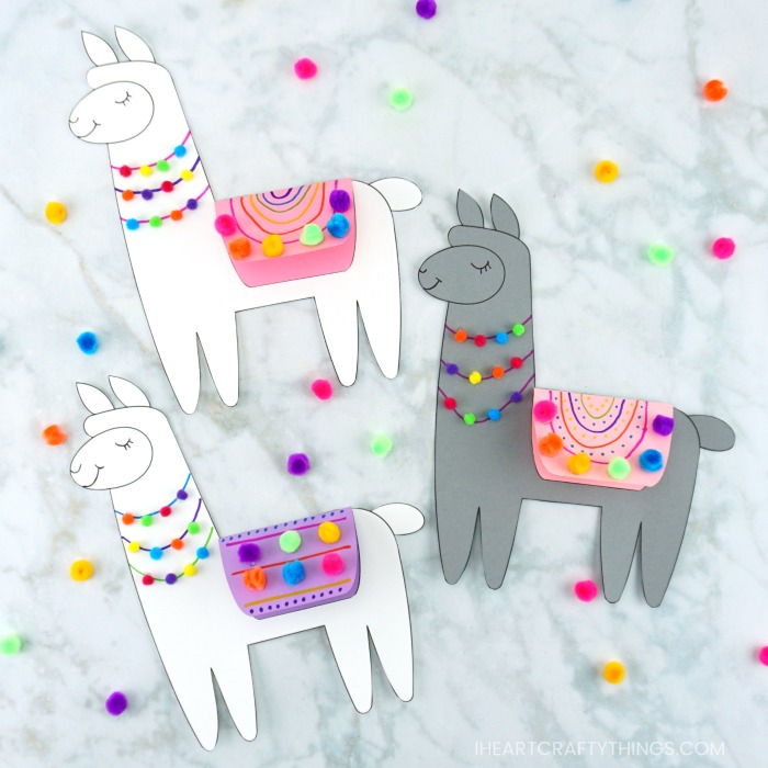 Three llama\'s decorated for Valentine\'s Day