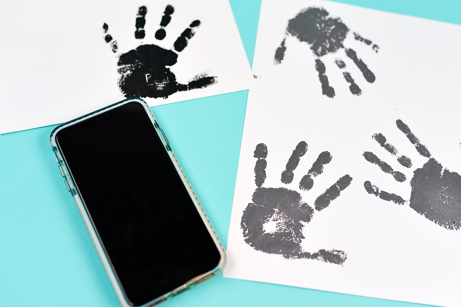 Take a photo of the handprints using your mobile phone.