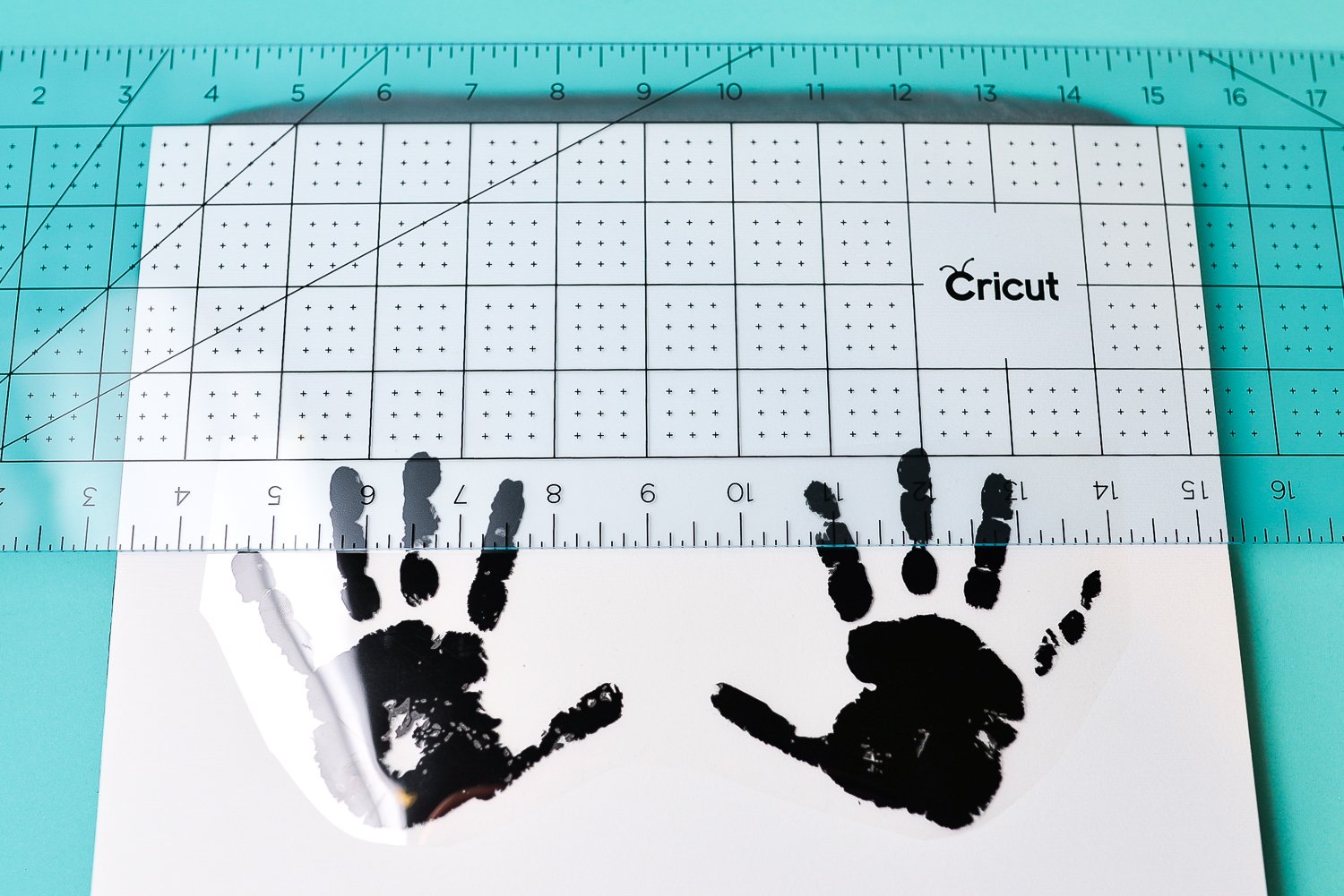 Use an acrylic ruler to help line up your iron on vinyl.