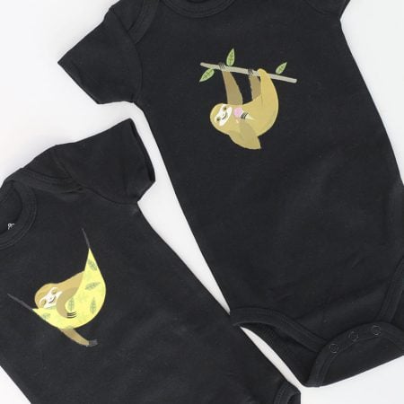 Two sloth images on two different black onesies