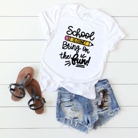 White t-shirt with an image of a pencil on it and the saying School is Done, Bring on the Fun