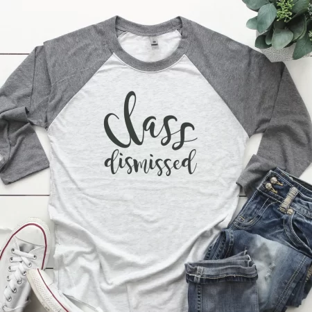 White and gray raglan sleeved style shirt with the saying Class Dismissed