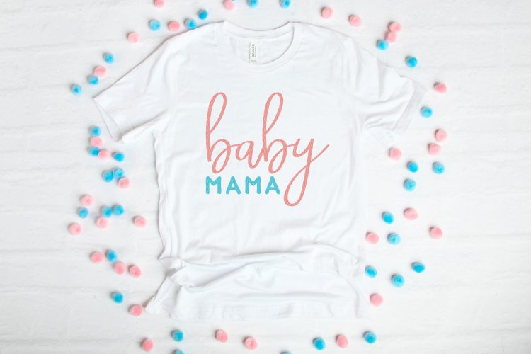 A white t-shirt decorated with the words, \"Baby Mama\"