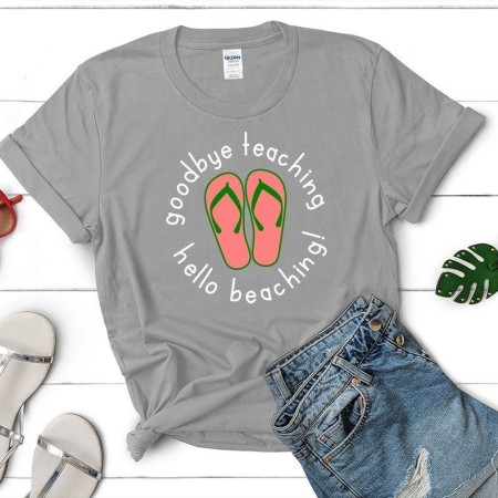 Gray t-shirt with an image of flip flops on it and the saying Goodbye Teaching Hello Beaching