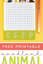 A pen next to a Forest Animal Word Search paper and advertising by HEYLETSMAKESTUFF.COM for a Free Printable Woodland Animal Word Search
