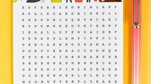 A pen next to a Forest Animal Word Search paper